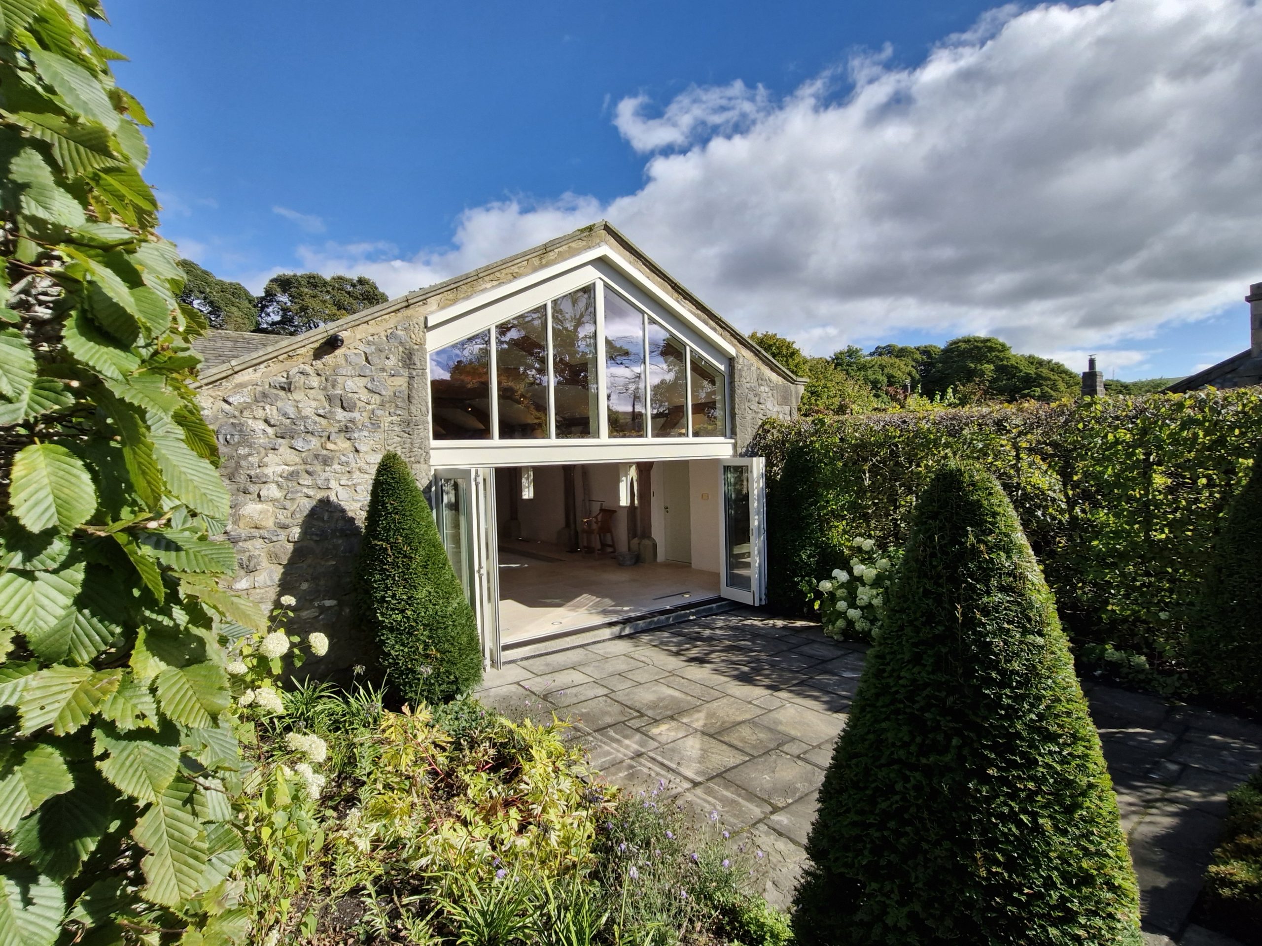 Bespoke Accoya Bi-Fold Doors open external - manufactured near Skipton and installed Near Grassington