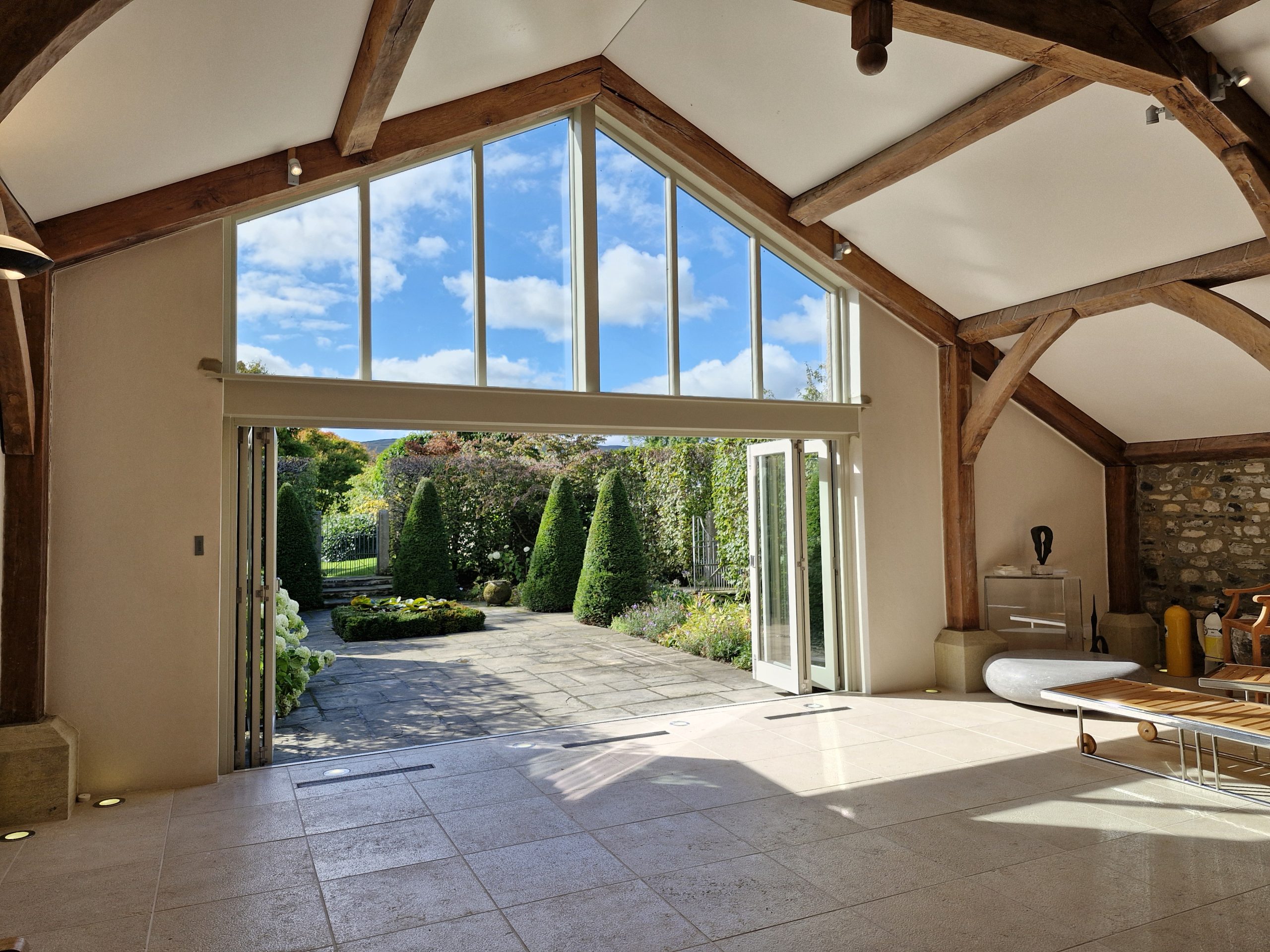 Bespoke Accoya Bi-Fold Doors open - manufactured near Skipton and installed Near Grassington