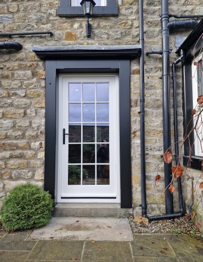Bespoke Timber Accoya Feature Entrance Door and surround and Georgian Bars, Manufactured in our Rylstone Workshop near Skipton and Installed in Burnsall, Craven, Yorkshire Dales