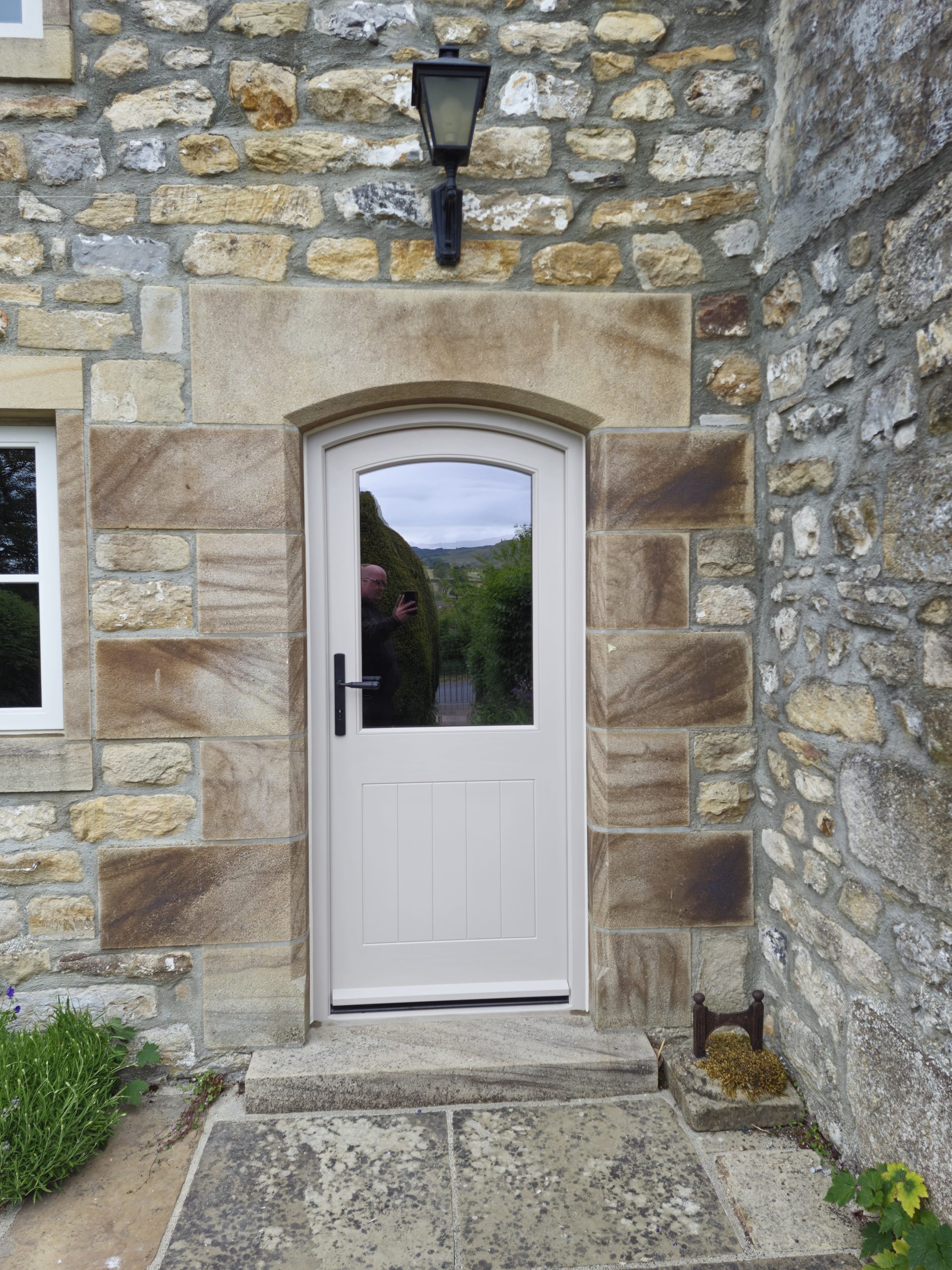 Bespoke Timber Accoya Feature Entrance Door with curved Head, Manufactured in our Rylstone Workshop near Skipton and Installed in Birstwith, Harrogate