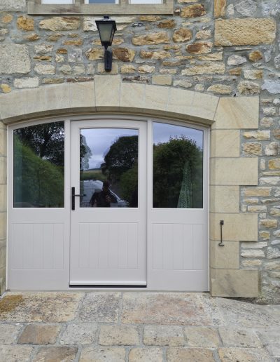 Bespoke Timber Accoya Feature Entrance Door with curved Head and Side lights, Manufactured in our Rylstone Workshop near Skipton and Installed in Birstwith, Harrogate
