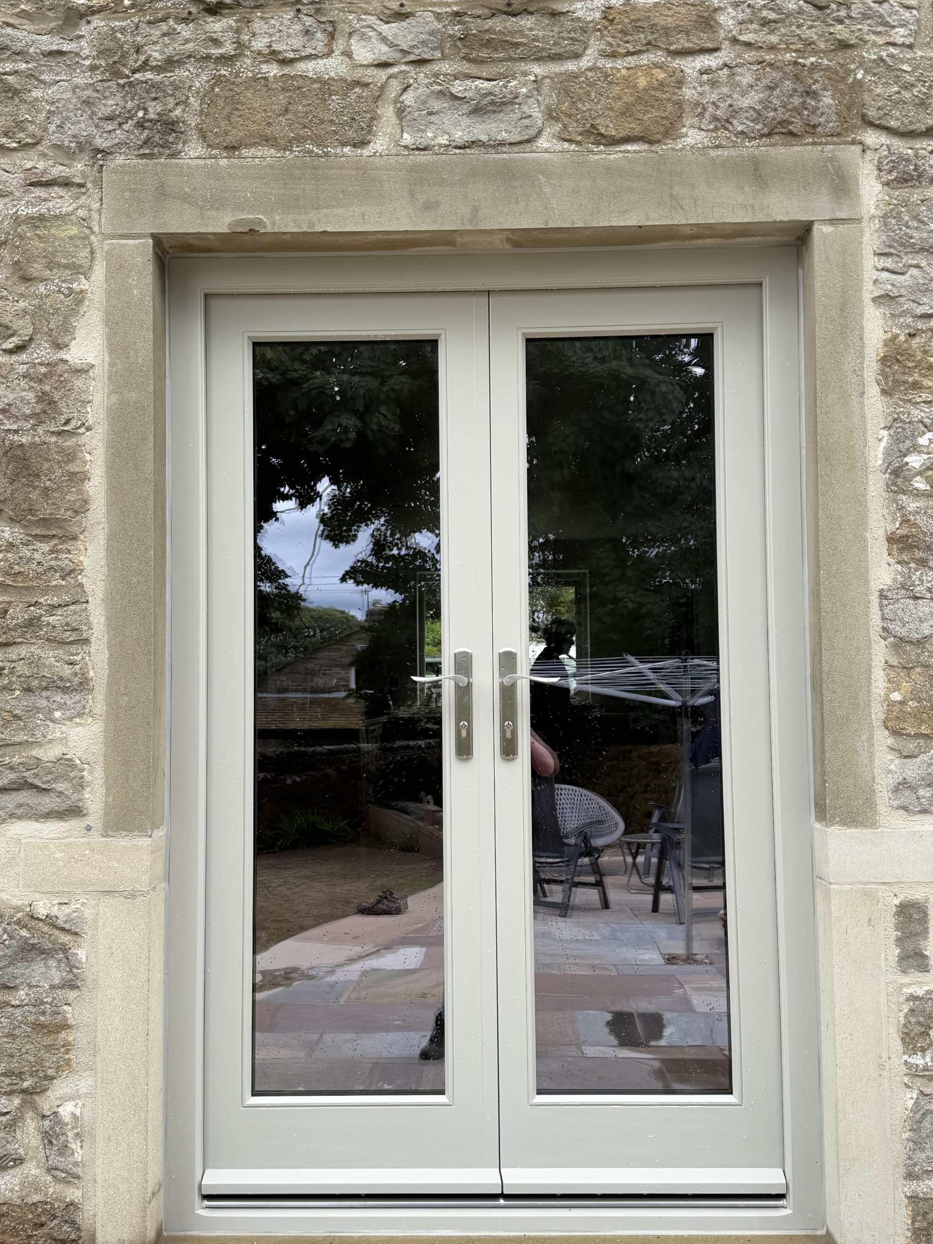 Bespoke Timber Accoya French Patio Doors, Manufactured in our Yorkshire Dales workshop, Skipton, installed in Whalley. Clitheroe