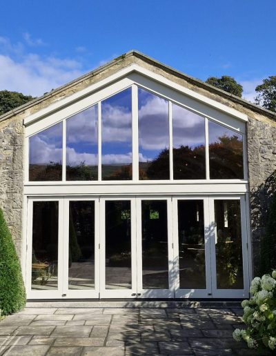 Bespoke-Timber-Wooden-Accoya-Frame-with-Bifold-Doors-Windows.-Manufactured-in-our-Workshop-near-Skipton-Ilkley.-Installed-in-Ilkely-Wharfedale-near-Yorkshire-Dales
