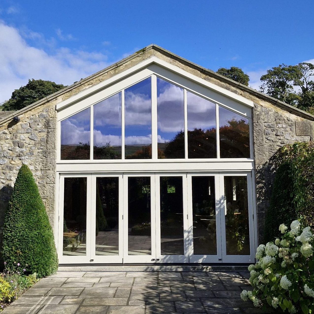 Bespoke-Timber-Wooden-Accoya-Frame-with-Bifold-Doors-Windows.-Manufactured-in-our-Workshop-near-Skipton-Ilkley.-Installed-in-Ilkely-Wharfedale-near-Yorkshire-Dales
