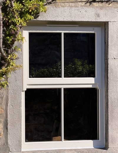Bespoke Timber Wooden Accoya Replacement Mock Sash Window. Manufactured in our Rylstone Workshop near Skipton. Installed in Windermere, south lake district, cumbria,