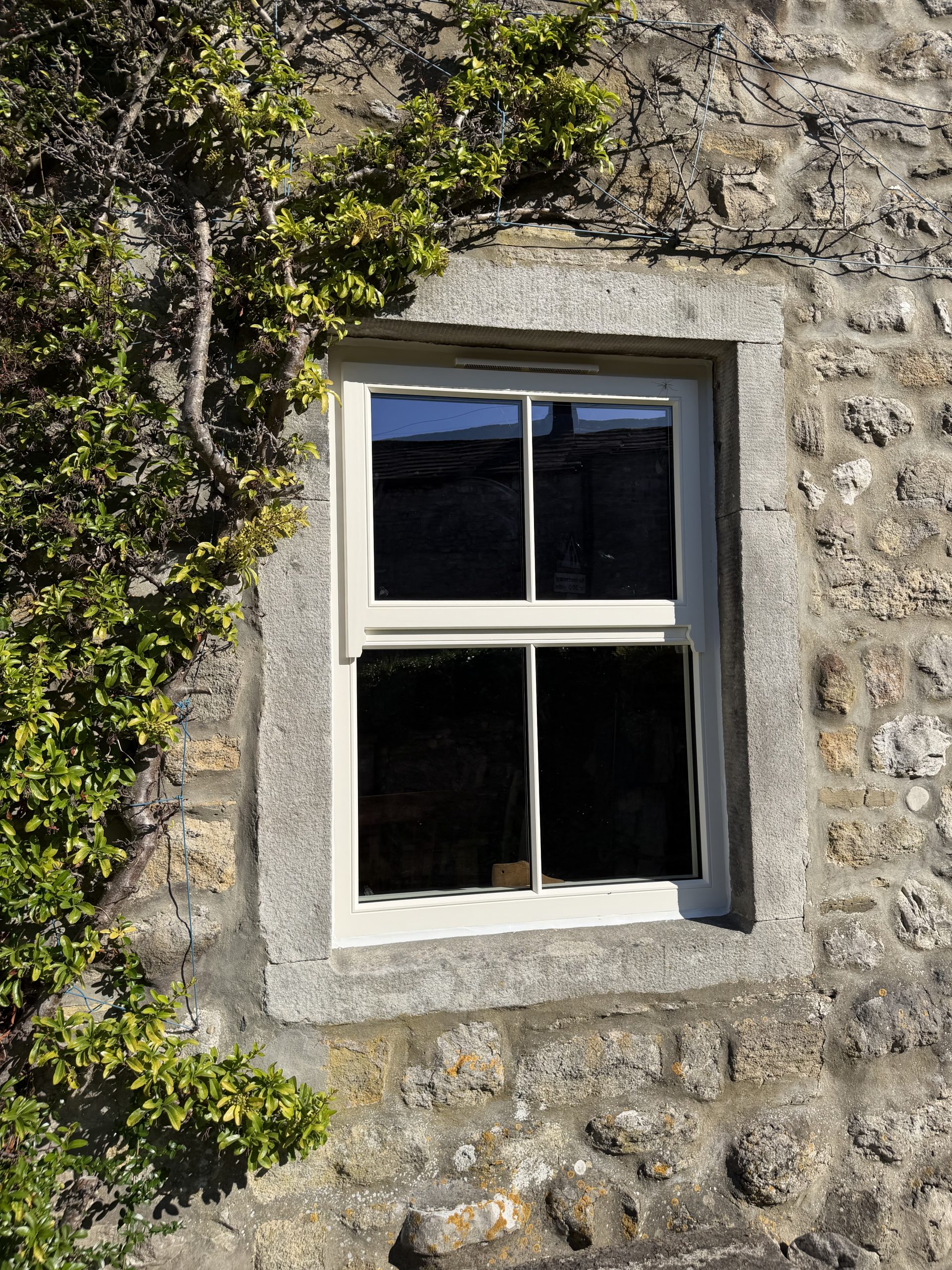 Bespoke Timber Wooden Accoya Replacement Mock Sash Window. Manufactured in our Rylstone Workshop near Skipton. Installed in Windermere, south lake district, cumbria