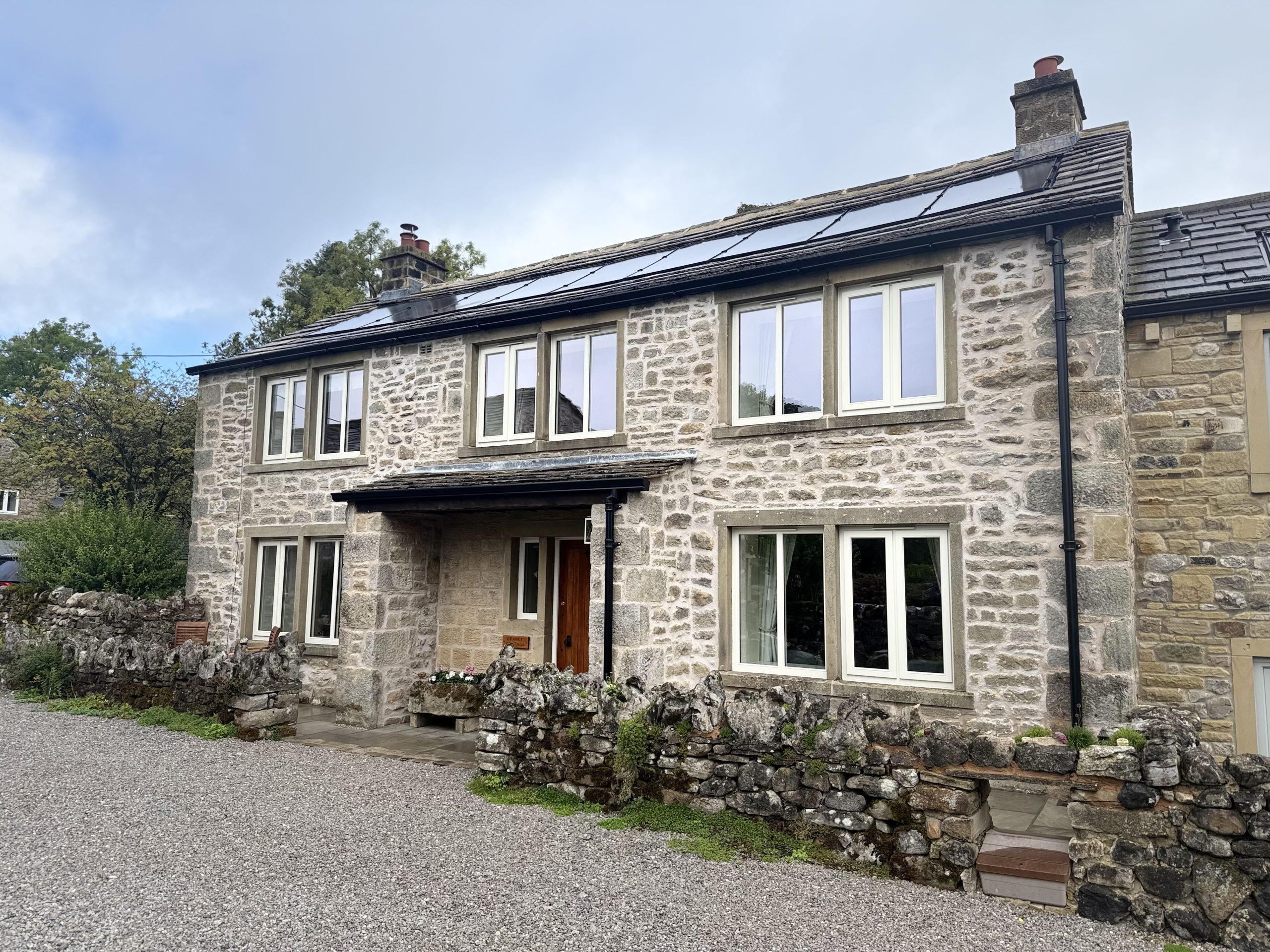 Full House of Bespoke Wooden Timber Hardwood Doors including Front Entrance Door and Wooden Timber Stormproof Side Opening Casement Windows. Handmade in our Rylstone Workshop, near Skipton, Ilkley, Clitheroe, Harrogate, Ripon, Settle. Installed in the Yorkshire Dales in Litton, Craven.