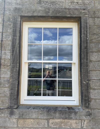 Bespoke Traditional Heritage Accoya Sliding Sash Window Featuring Georgian bars. Manufacturued in our yorkshire dales workshop. Installed Burnsall, Skipton, Craven, Yorkshire Dales