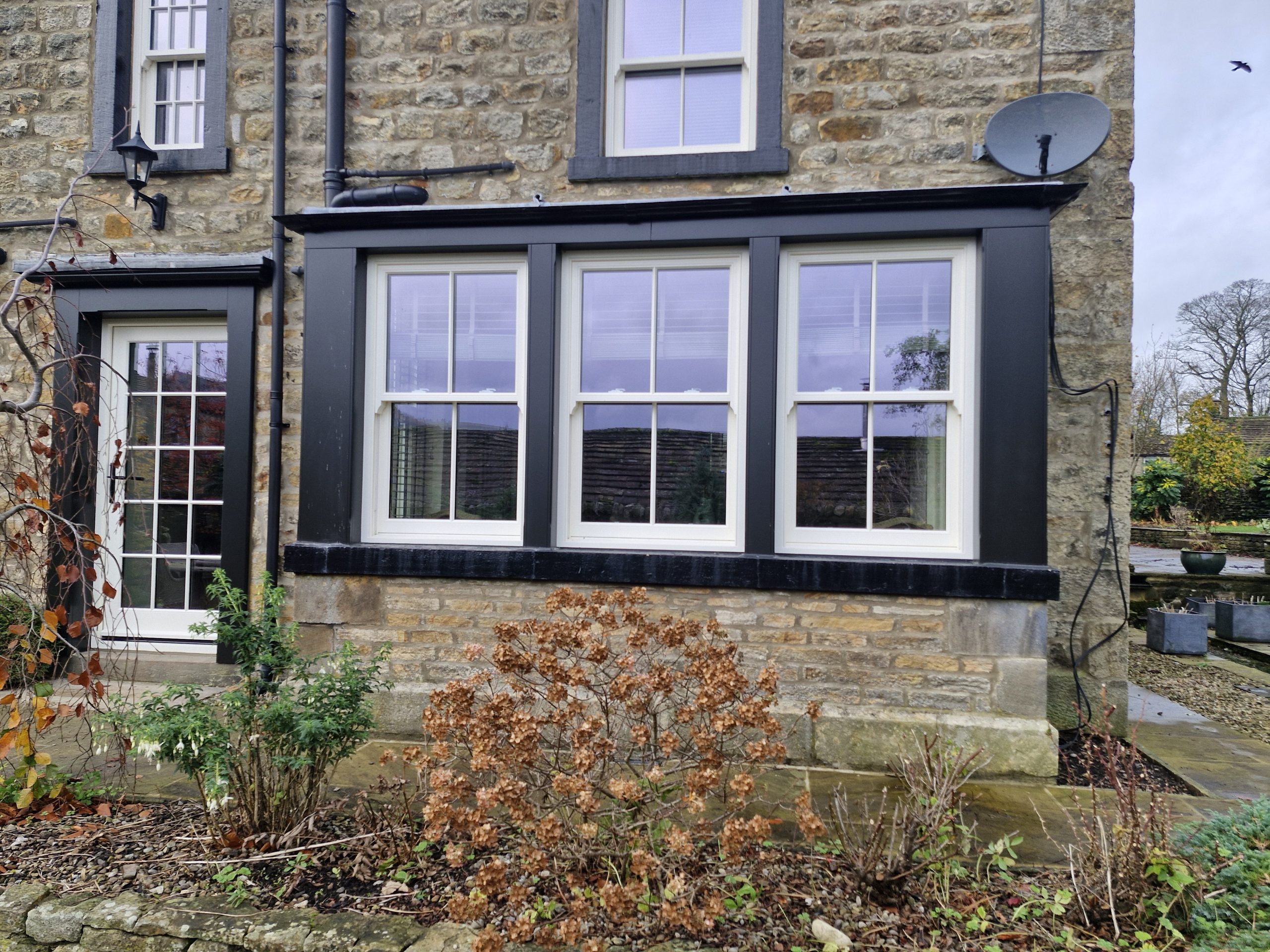 Bespoke Wooden Accoya Timber Sliding Sash Bay Windows. Handmade in our Rylstone Workshop, near Skipton installed in Burnsall, Craven Yorkshire Dales