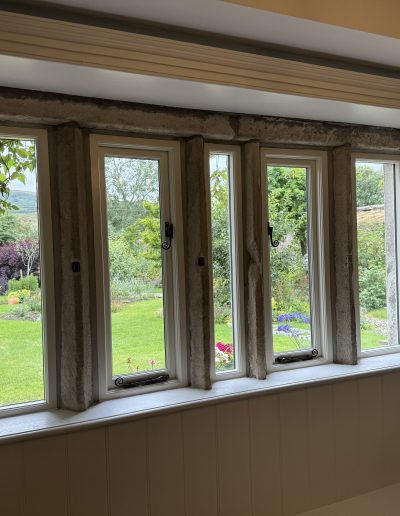 Bespoke Wooden Accoya Timber heritage Windows with slimline glass. Handmade in our Rylstone Workshop, near Skipton installed in Burnsall, Craven Yorkshire Dales