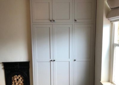 Stunning Bespoke Cabinetry Timber Wooden Dressing Room With Made to Measure Bespoke Fitted Wardrobes. Shaker Style. Designed and Handcrafted in our Rylstone Workshop near Skipton, Ilkley, Harrogate, York and Settle. Installed in Kettlewell, Wharfedale, Craven, Yorkshire. Cabinetmakers Ilkley, Skipton Joinery.