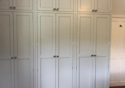 Bespoke Timber Wooden Made-to-measure Fitted Wardrobes Shaker Style. Handcrafted in our Rylstone Workshop near Skipton, Ilkley, Harrogate, Settle. Installed in Pateley Bridge, Nidderdale, Near Ripon. Millybell Interiors.